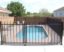 Fences Around Swimming Pools: Understanding Safety Codes and Best Practices